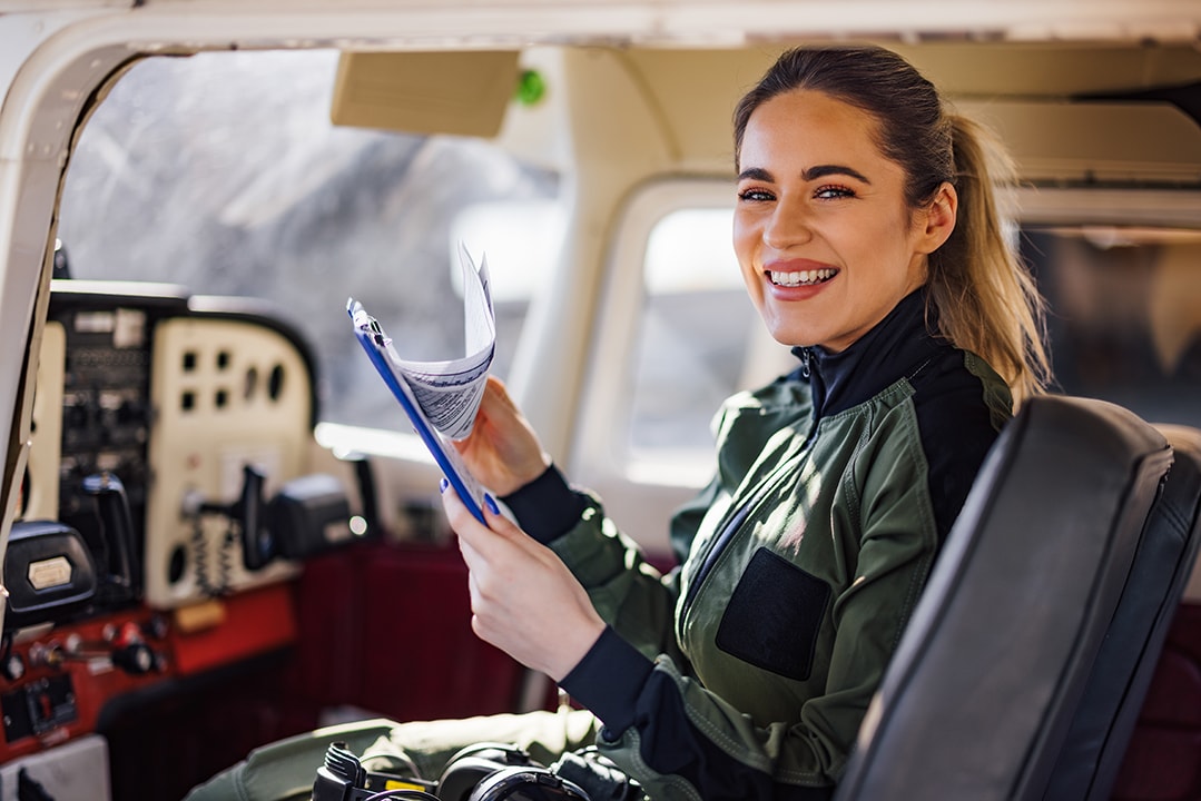 student pilot preparing flight test checklist