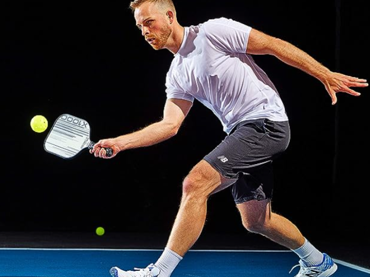 An image showing a man using a Franklin pickleball paddle.