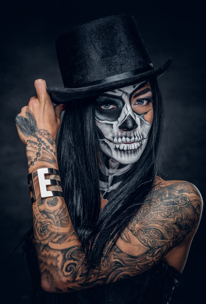 A girl with a Santa Muerta Tattoo