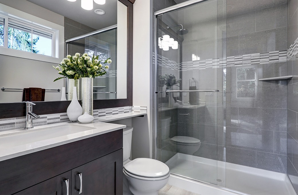 A compact bathroom layout maximizing space with a walk-in shower.