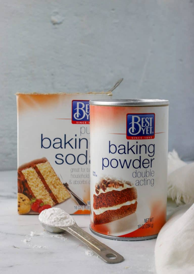 can of baking powder and box of baking soda