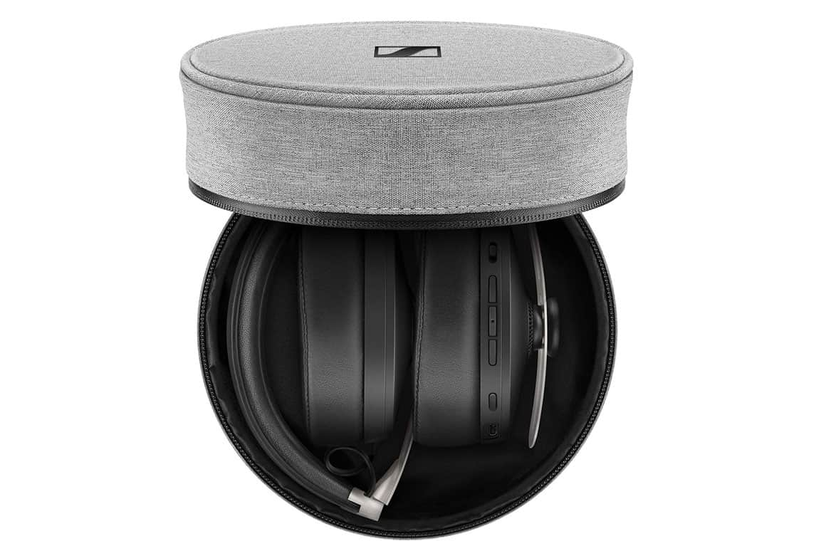 Photo of Sennheiser Momentum 3 Wireless noise-cancelling headphones, featuring a sleek black design with soft ear cushions and adjustable headband in a beautiful grey soft case .