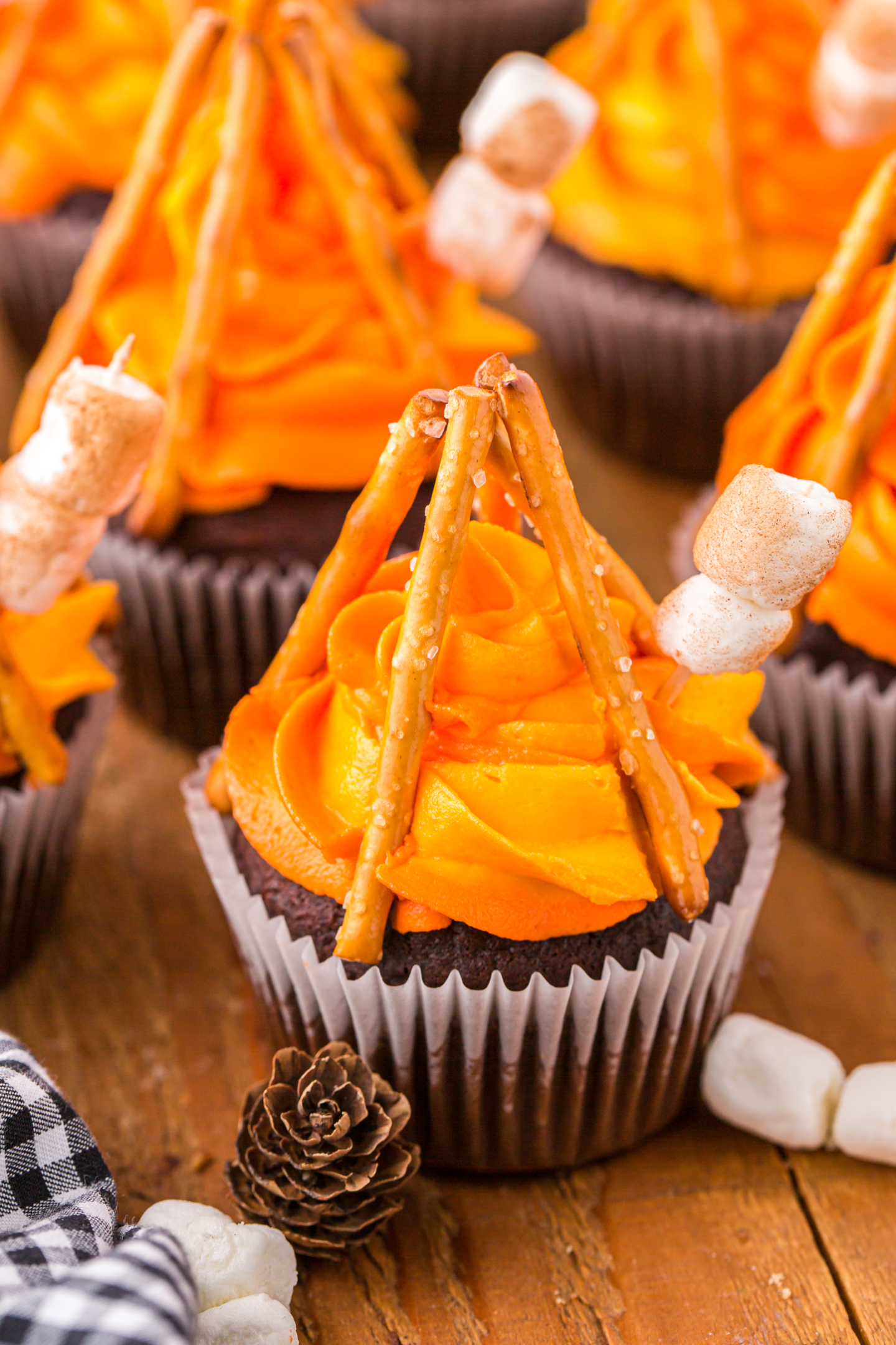 campfire cupcakes on a wooden board