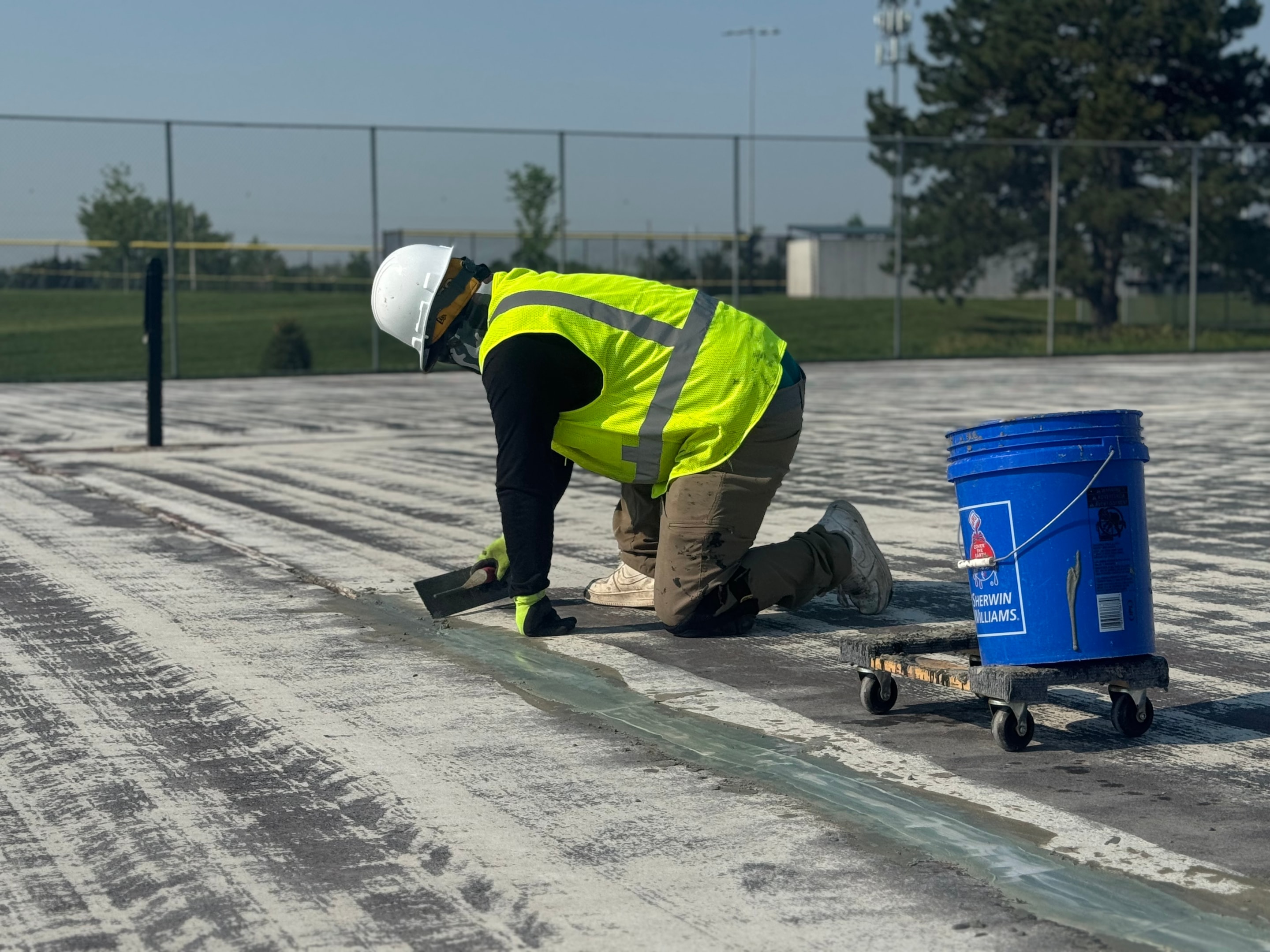 Pro Track & Tennis Crew on the job