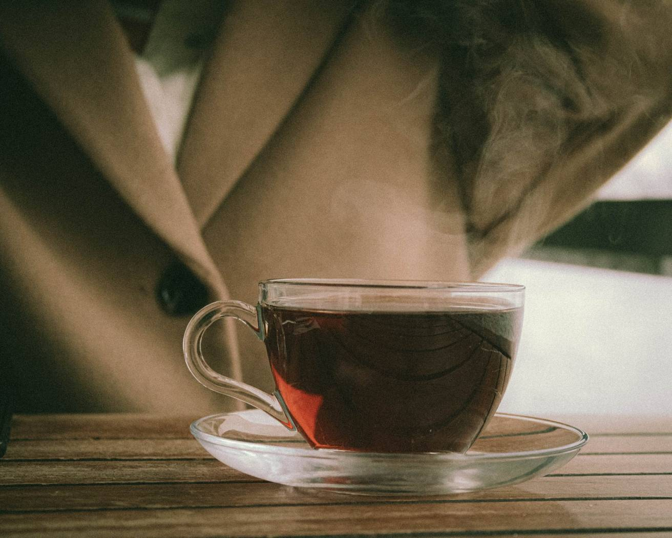 What are the of black tea and its side effects?