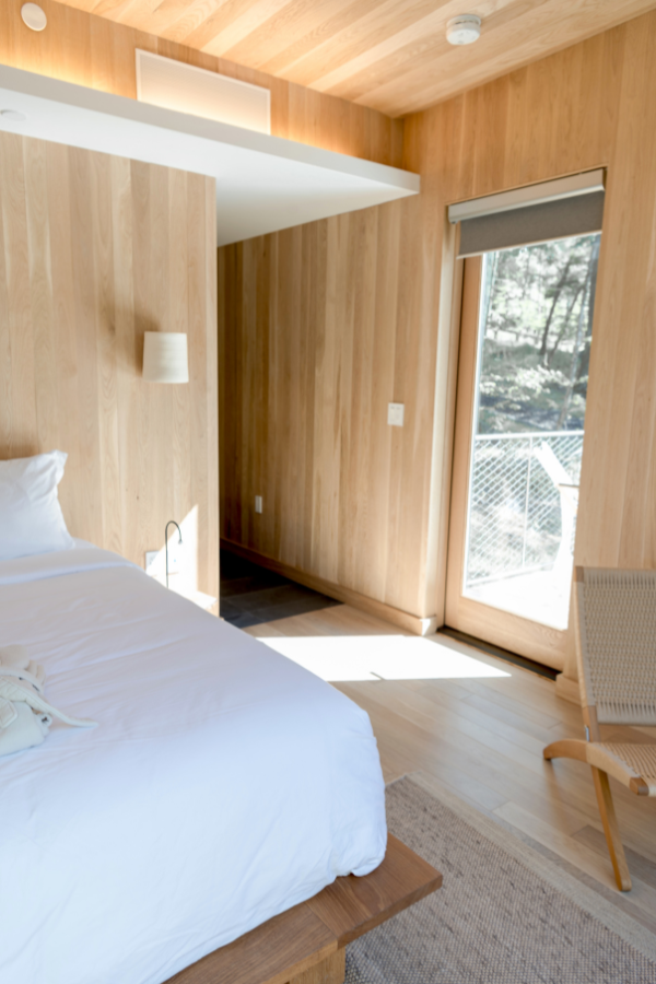 a hotel room with a large window