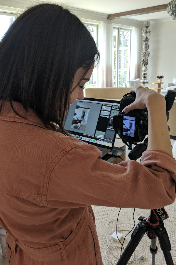 an interior designer photographing a space