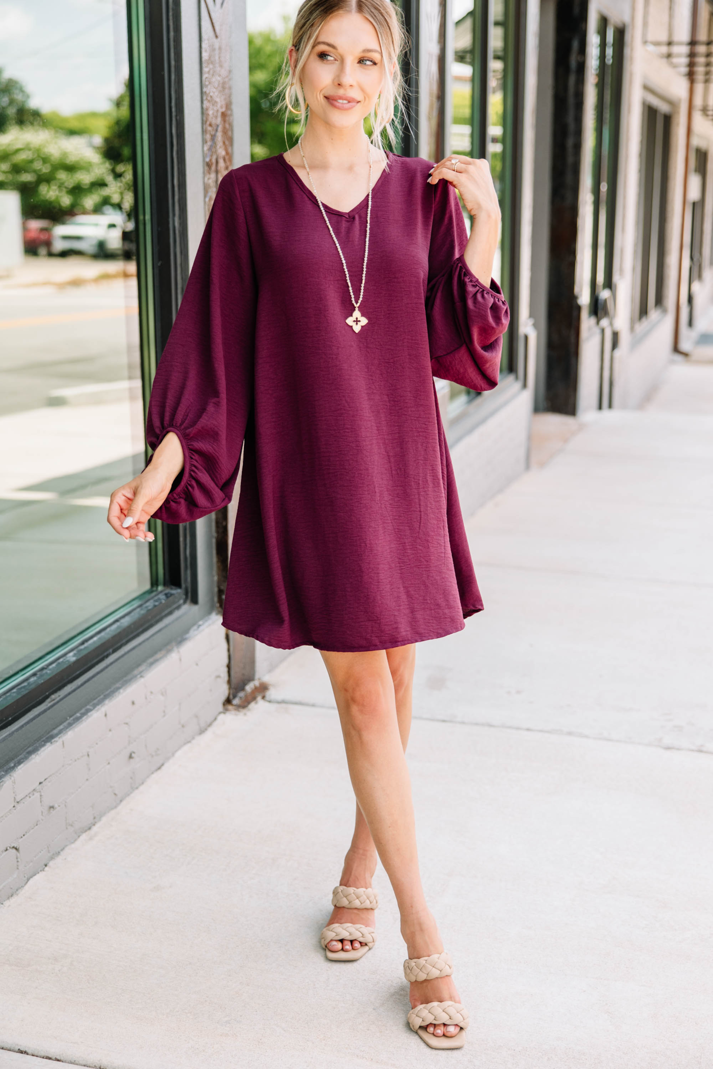 https://shopthemint.com/products/loud-and-clear-eggplant-purple-bubble-sleeve-dress?variant=39654332530746