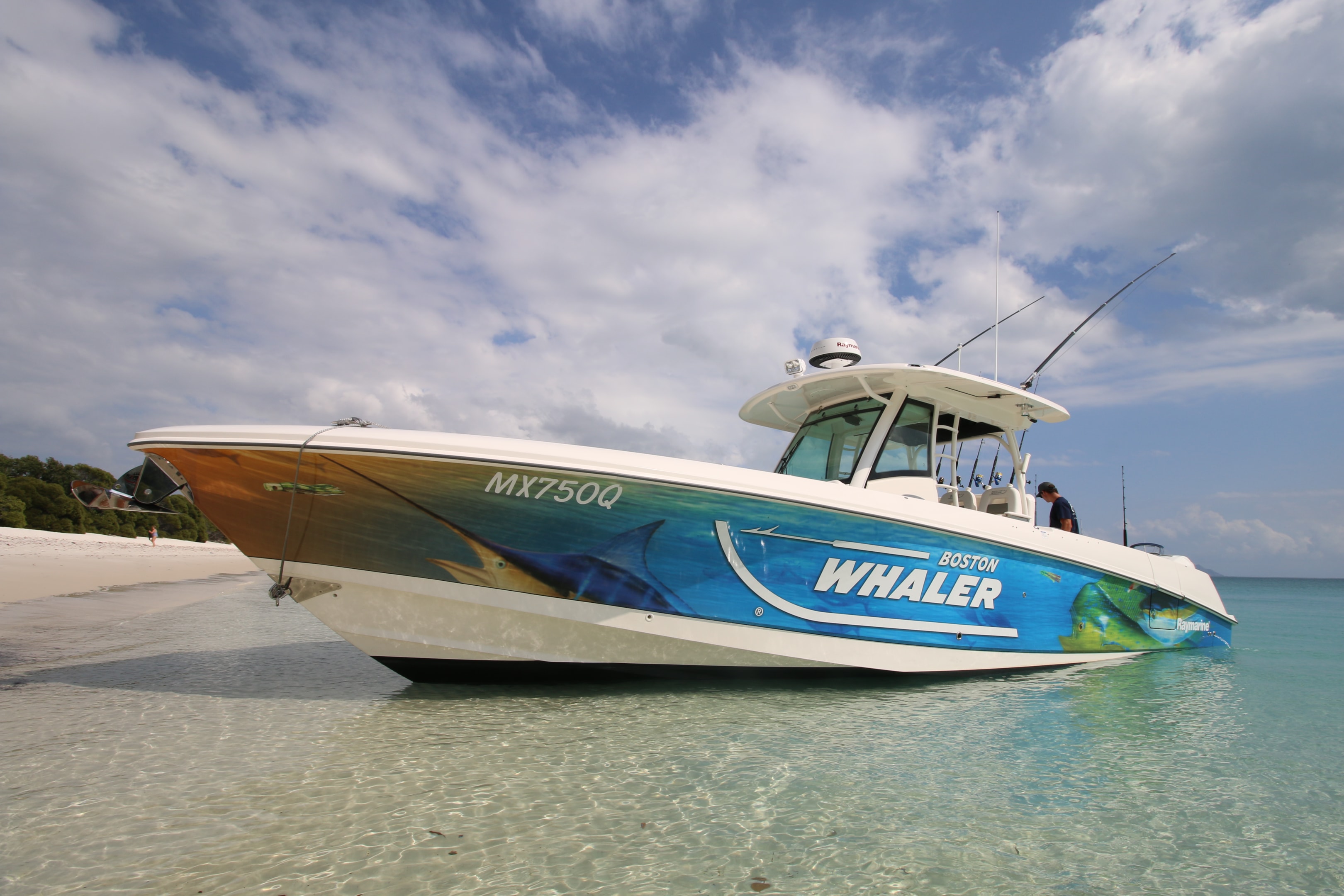 The 350 Outrage features overboard draining fish lockers, eight gunwale rod holders, a large forward lounge and flip up bolsters