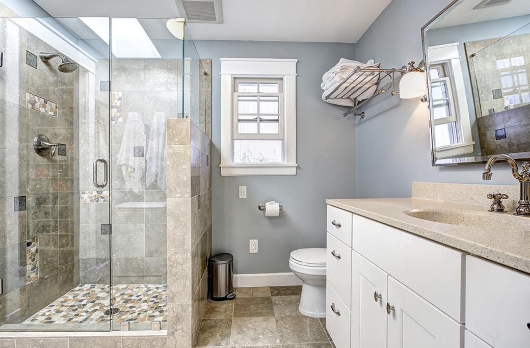 Customized shower fixtures and stylish designs in a new shower.