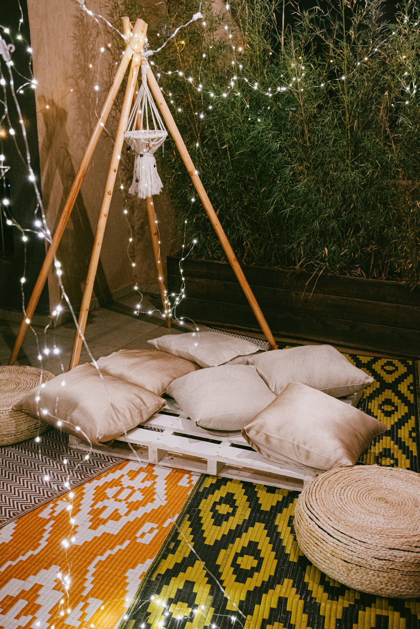 Patterned outdoor carpets turn the balcony into a living room