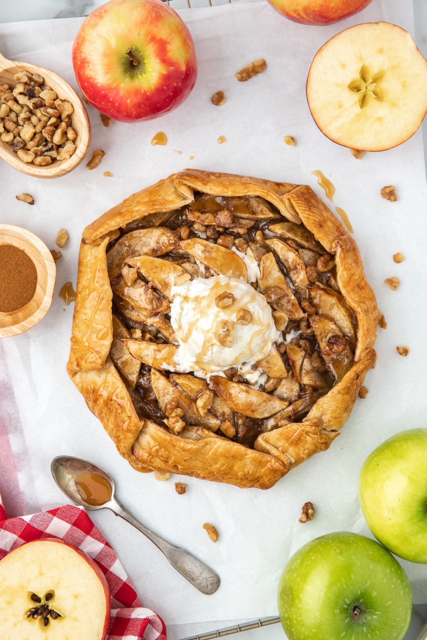 whole apple crostata topped a scoop of vanilla icecream