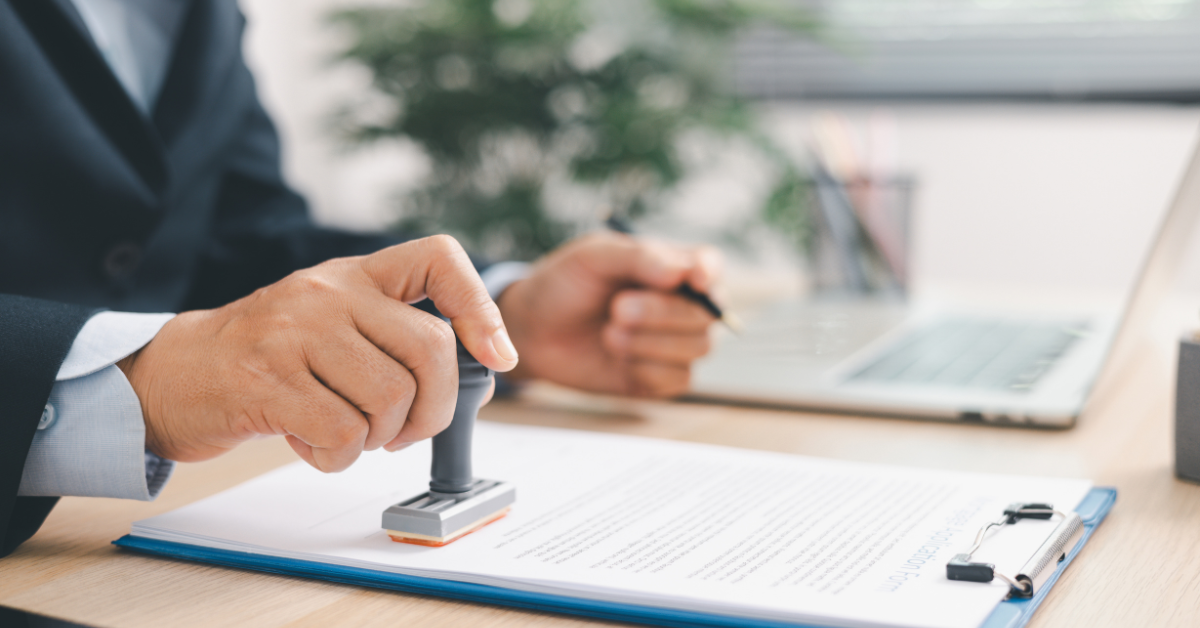 Professional reviewing and approving documents for an Uber accident insurance claim.
