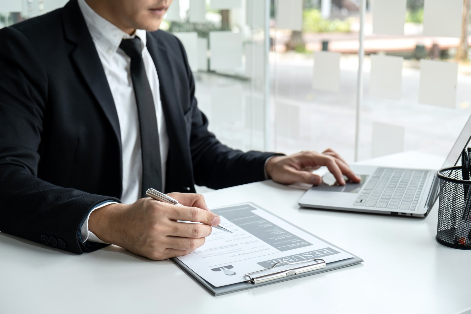 Hiring manager reviewing resume.