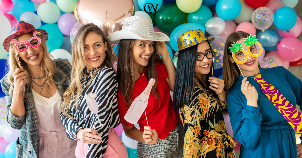 Graduation photo booth props can help you make fun memories. Hats and silly paper sunglasses are photo booth favorites.