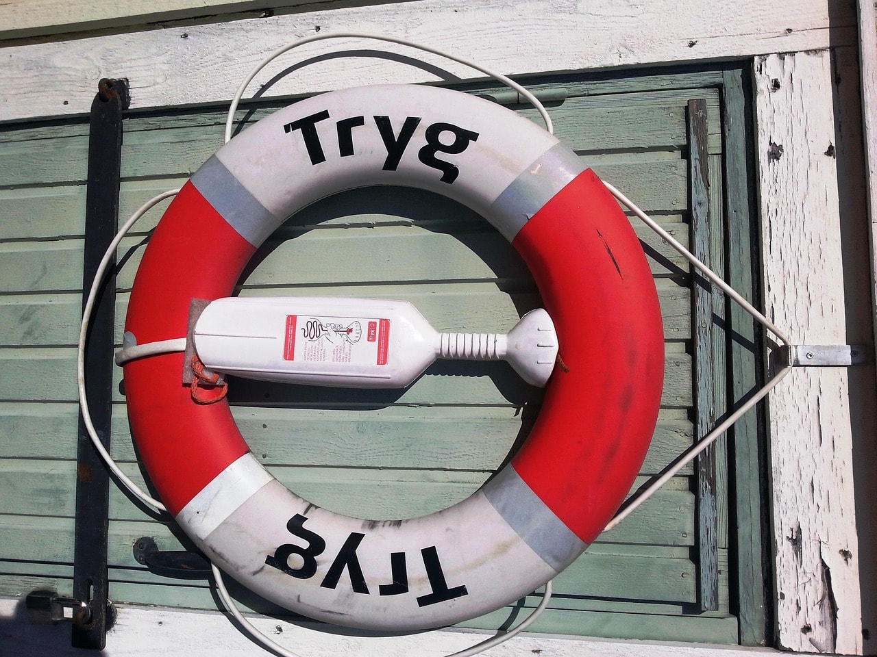 A custom-branded lifebuoy mounted for safety.