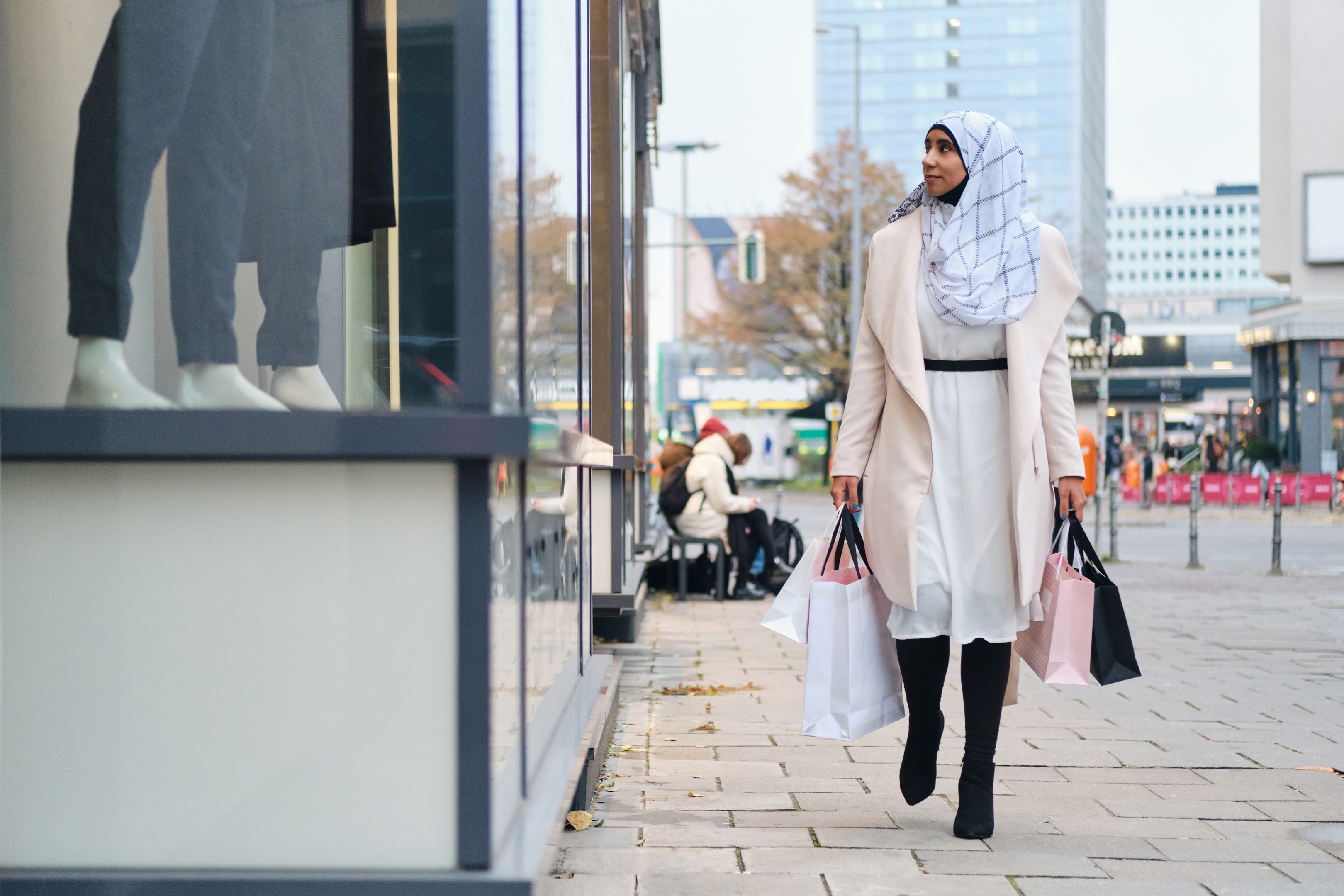 A muslimah going shopping for Eid gifts