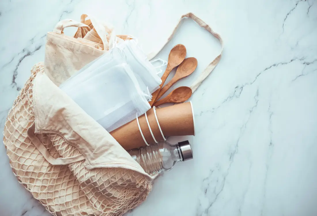 Eco friendly merchandise crafted from organic cotton bamboo cork and wheat straw with reusable drinkware travel mugs and bags offering sustainable alternatives that reduce waste and lower carbon footprint while supporting corporate social responsibility