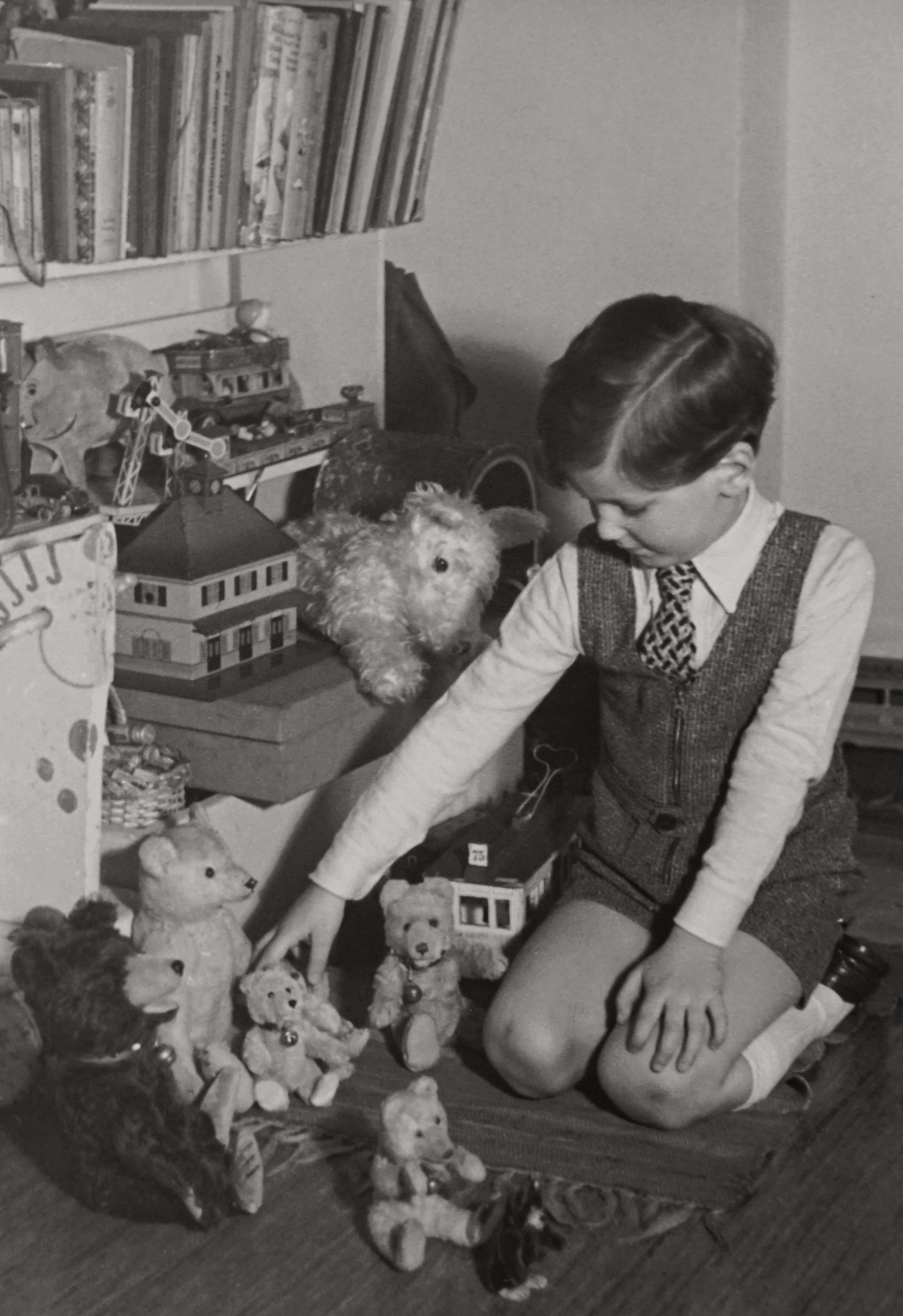 Child Playing with Vintage Bears