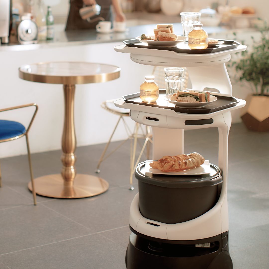 A Servi robot delivering food in a french bakery, making Servi an international robotics sensation originating in Japan.