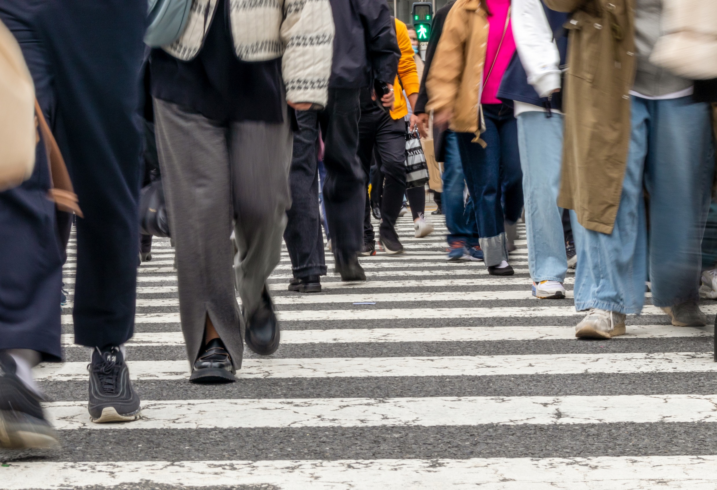 Pedestrians using a zebra crossing.