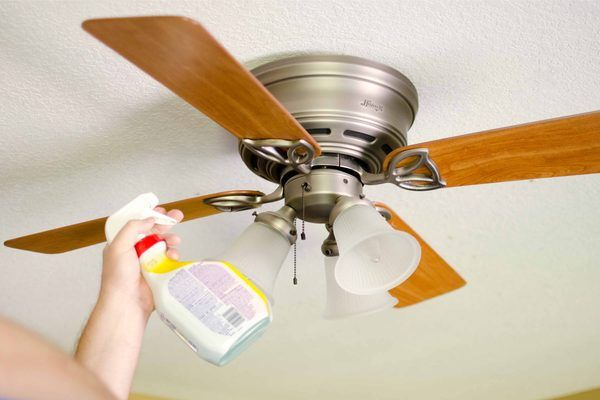 Have clean ceiling fans by polishing them with a dust-repellant spray