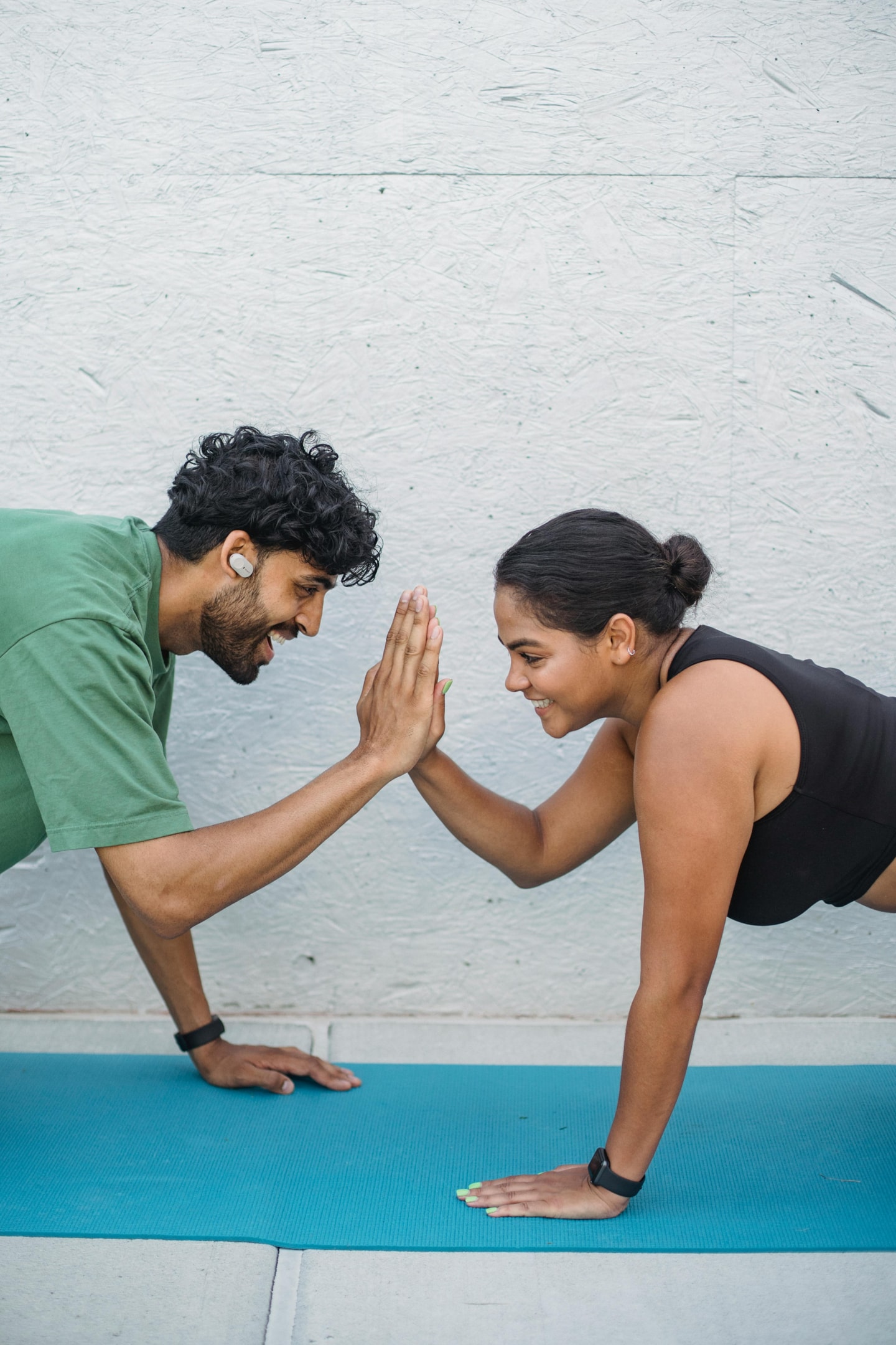 Photo by Ketut Subiyanto: https://www.pexels.com/photo/a-man-and-woman-working-out-together-while-doing-high-five-5039514/