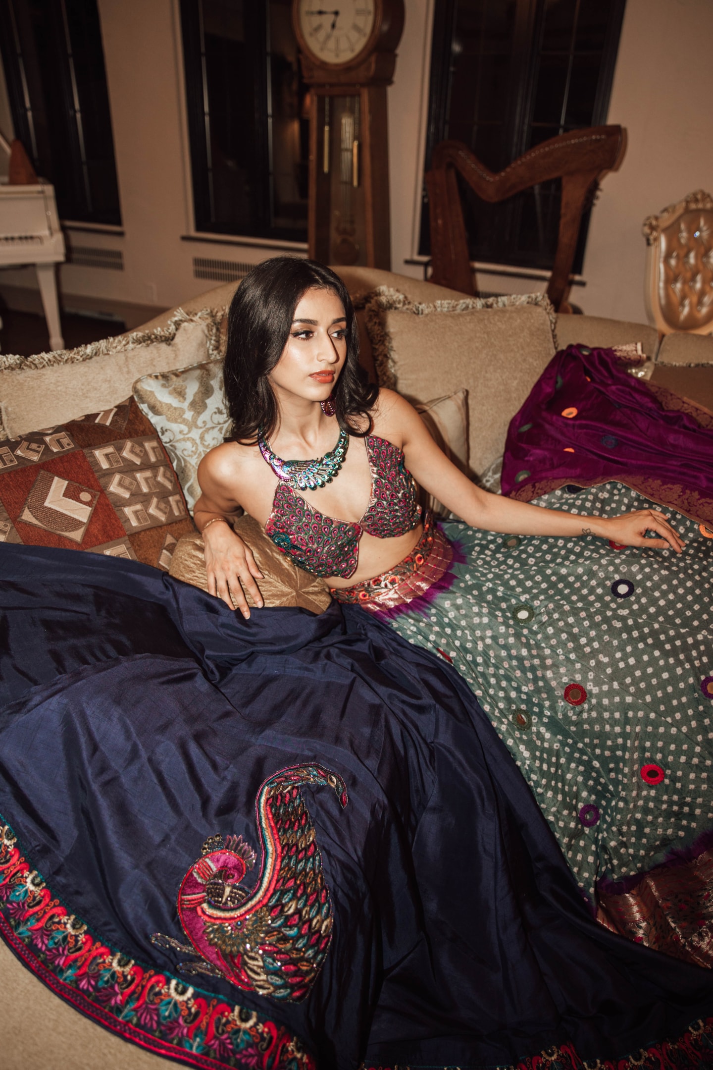 An array of beautiful wedding designer lehengas displayed in a boutique.