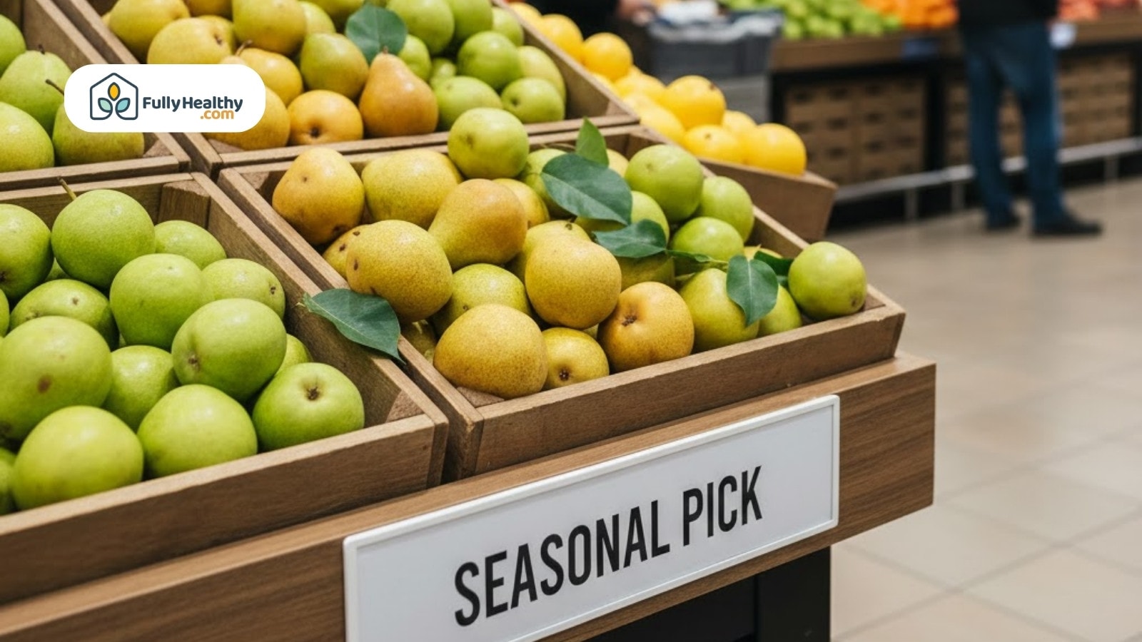 Grocery display of green and yellow pears labeled seasonal pick