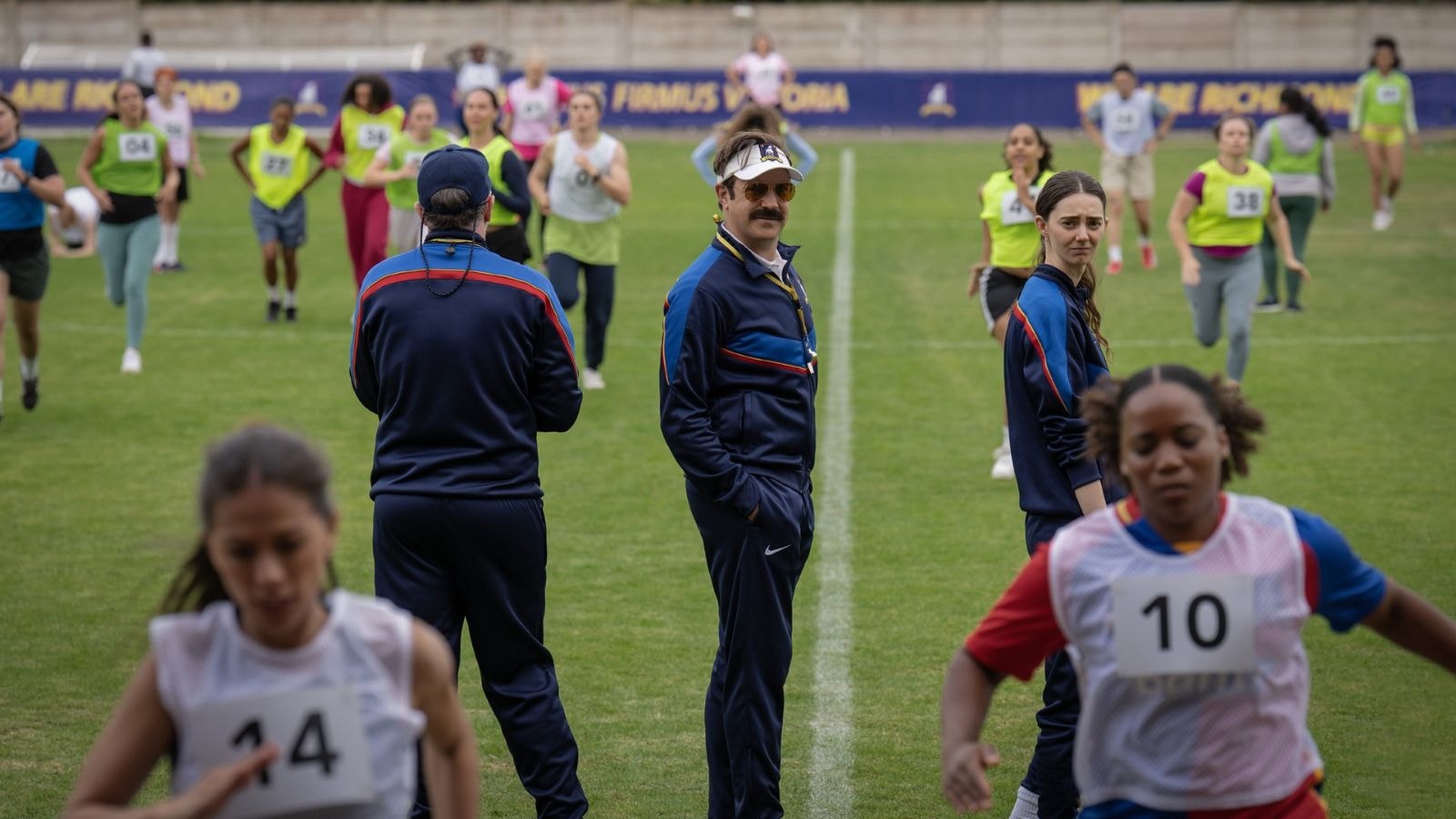 Jason Sudeikis as Ted Lasso and Brendan Hunt as Coach Beard in Ted Lasso Season 4