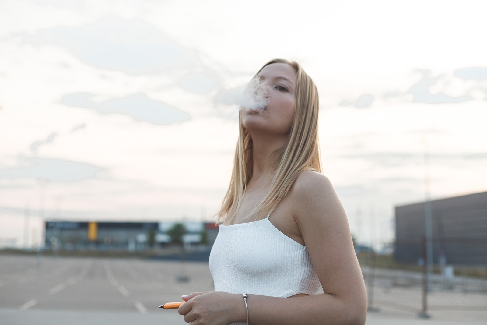 Woman vaping cannabis