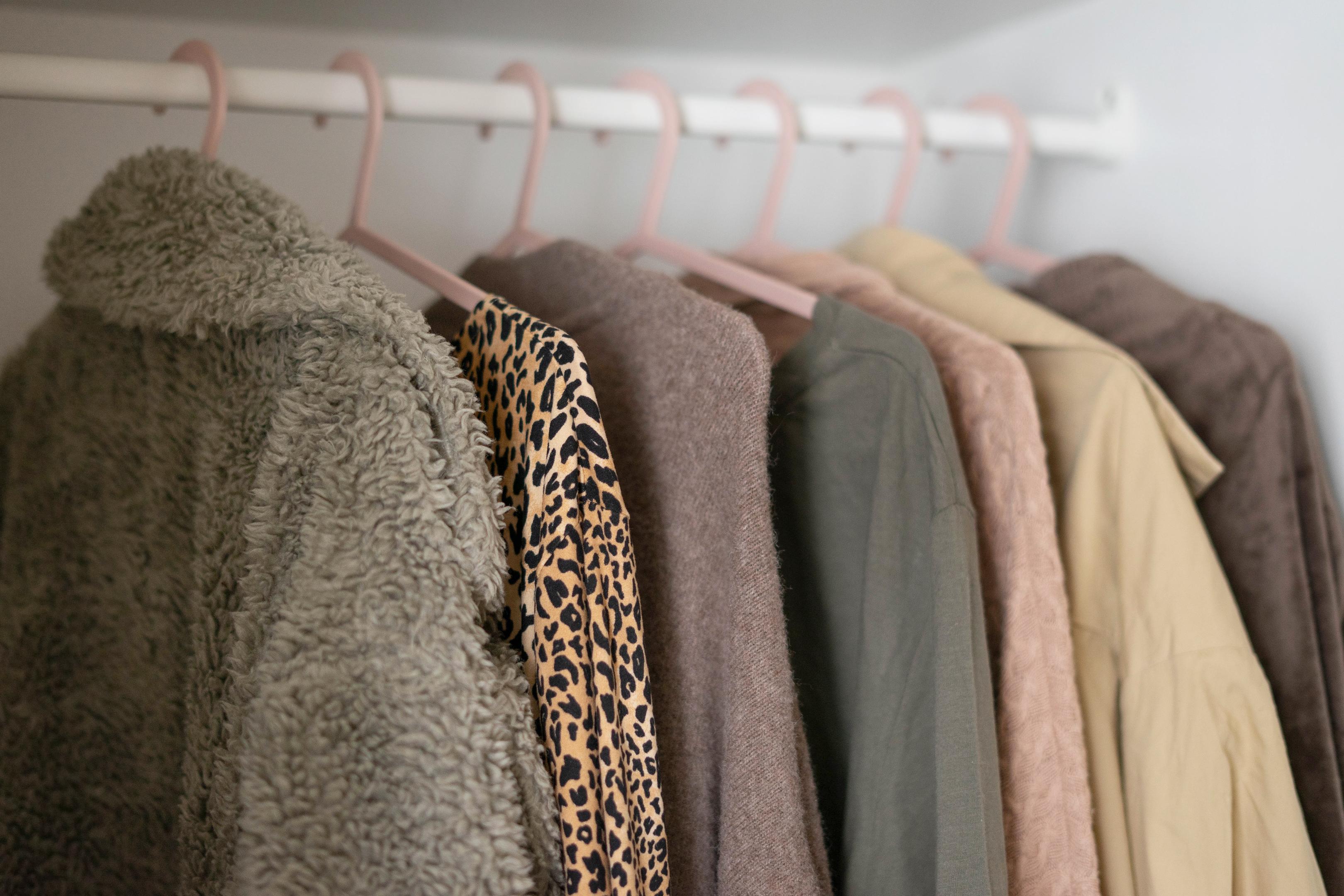 coat hanging on rail