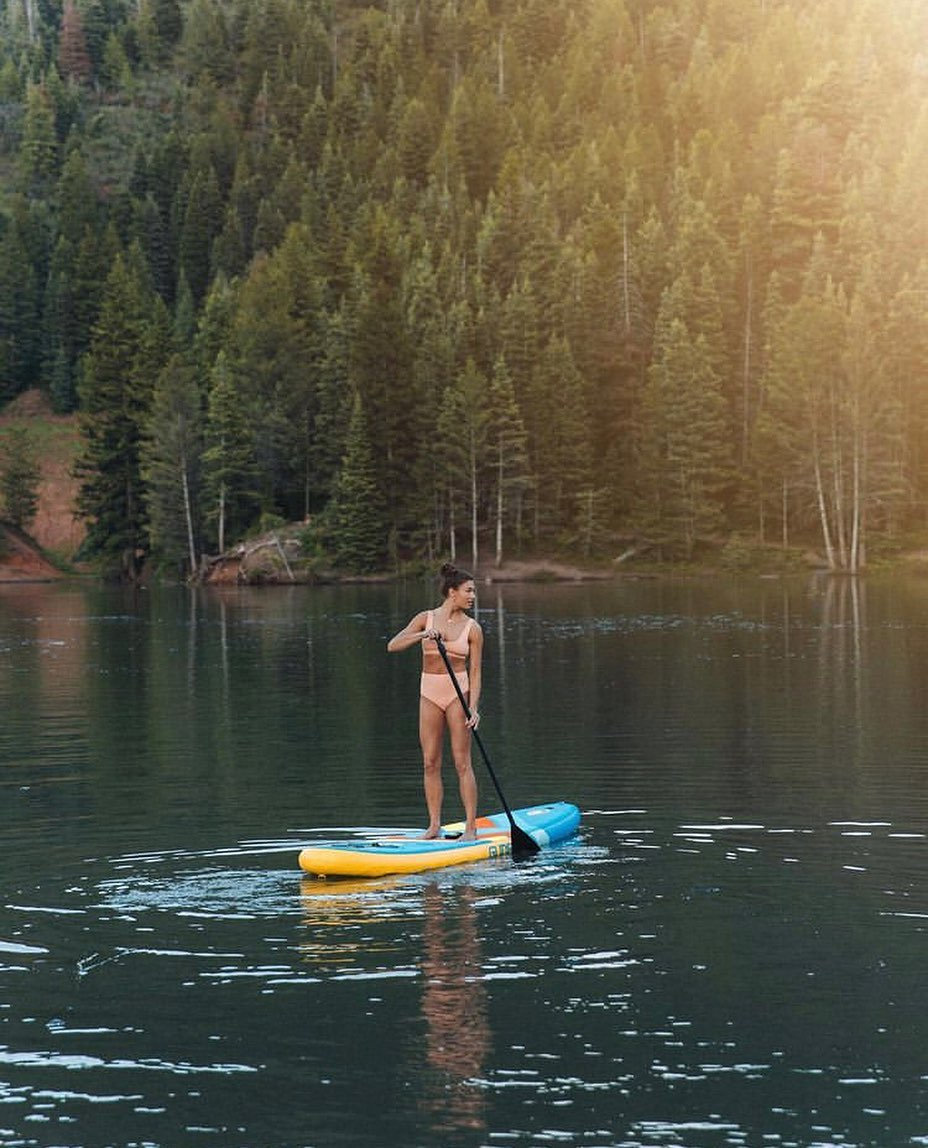 fishing gear on a stand up paddle board