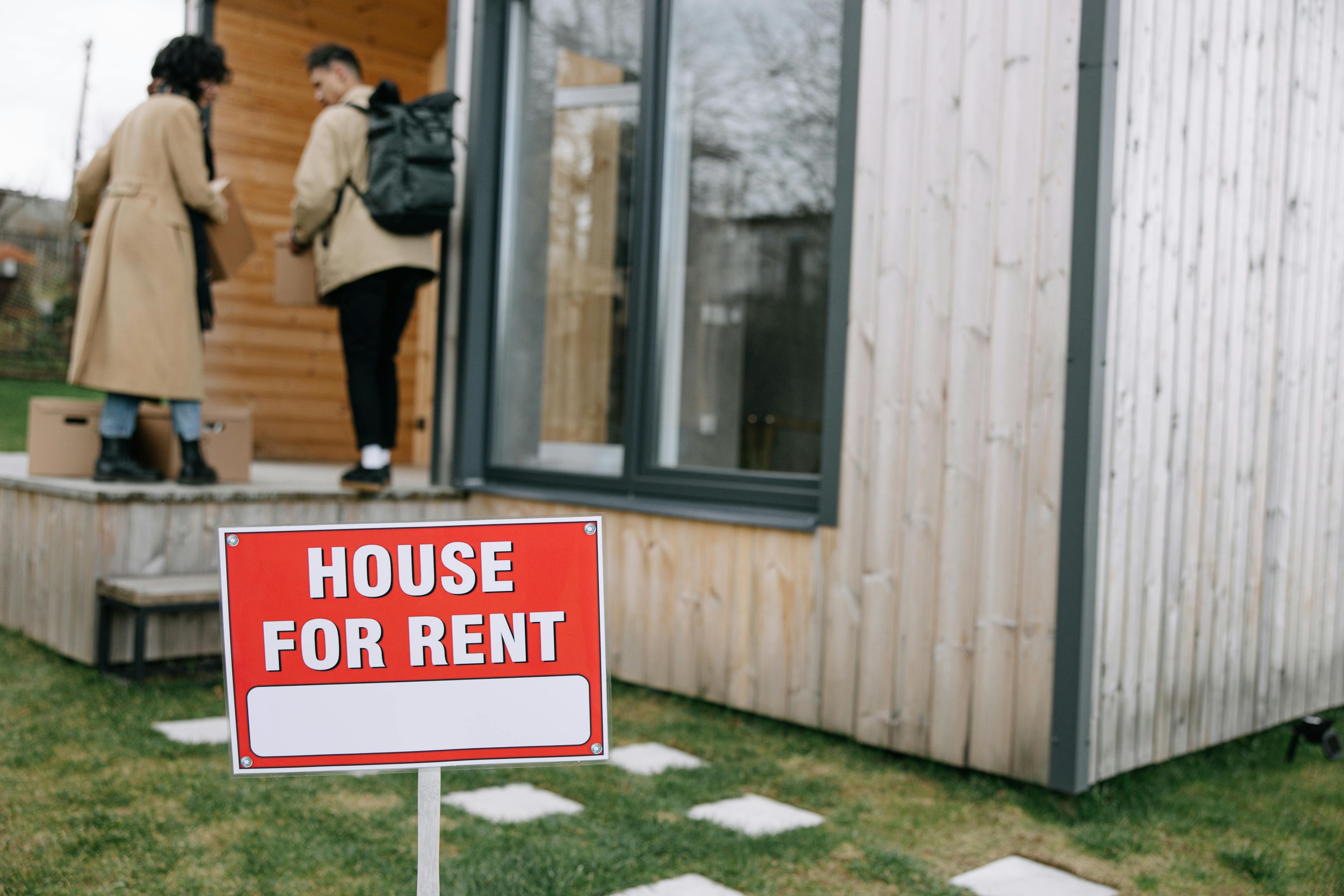 House for rent sign in front of property purchased by investor through a DSCR loan.