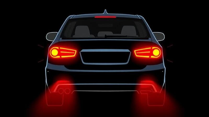 Illustration of tail lights turning on when headlights are activated, viewed from rear.