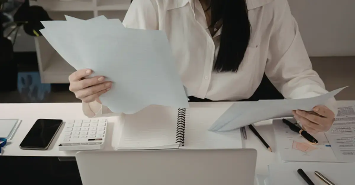 Creator matching receipts with bank transactions to show how to keep track of business expenses.