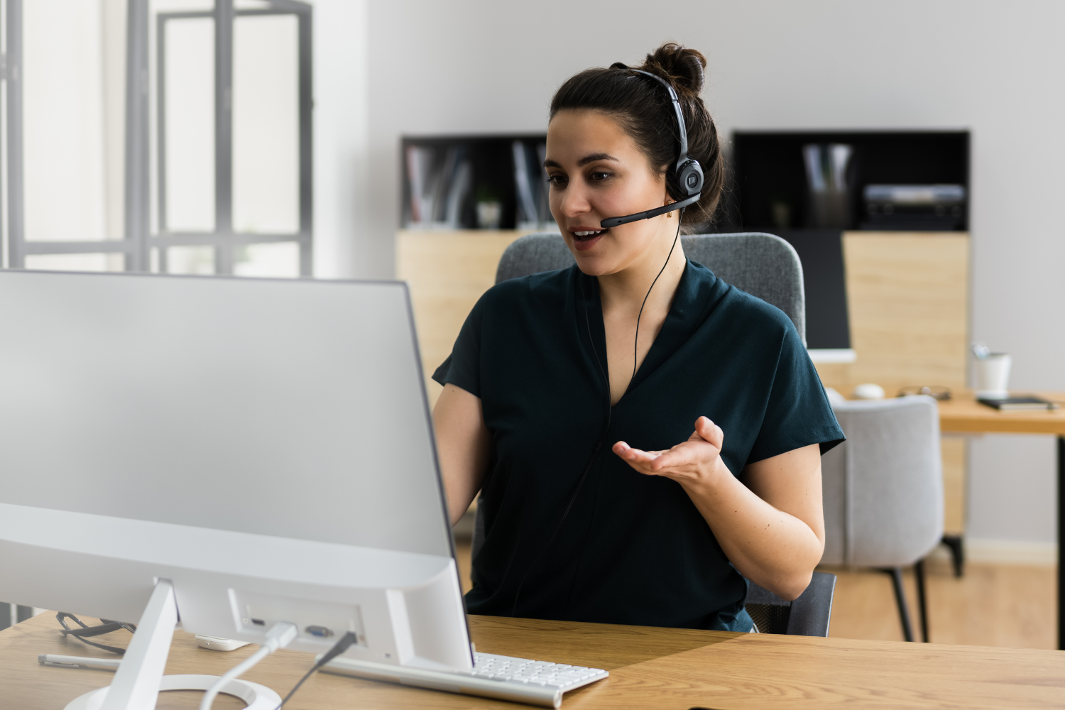 A customer service representative speaking to a client/customer.