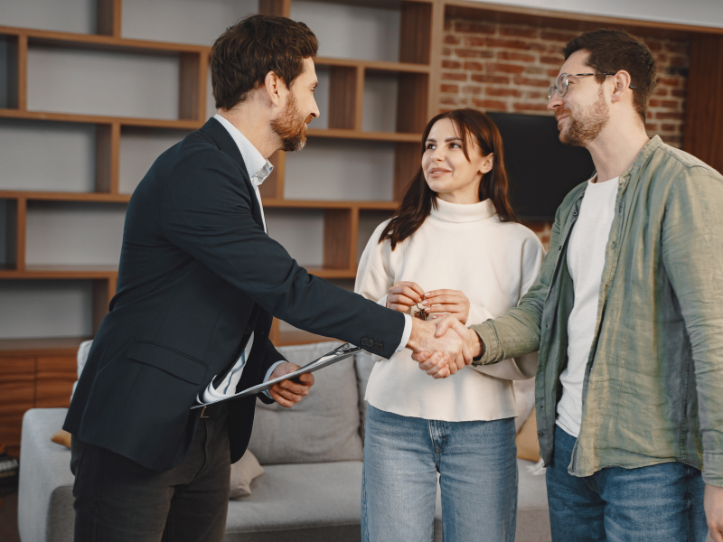 Image of a couple talking to a lawyer.