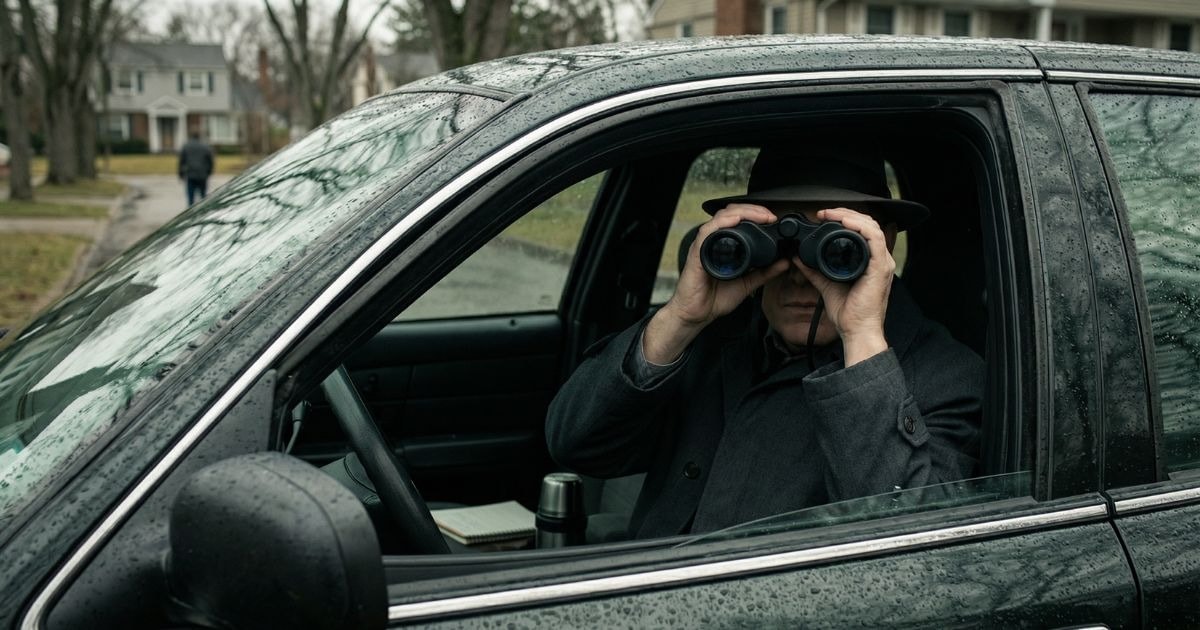 Professional surveillance camera mounted on building exterior in Orange County.