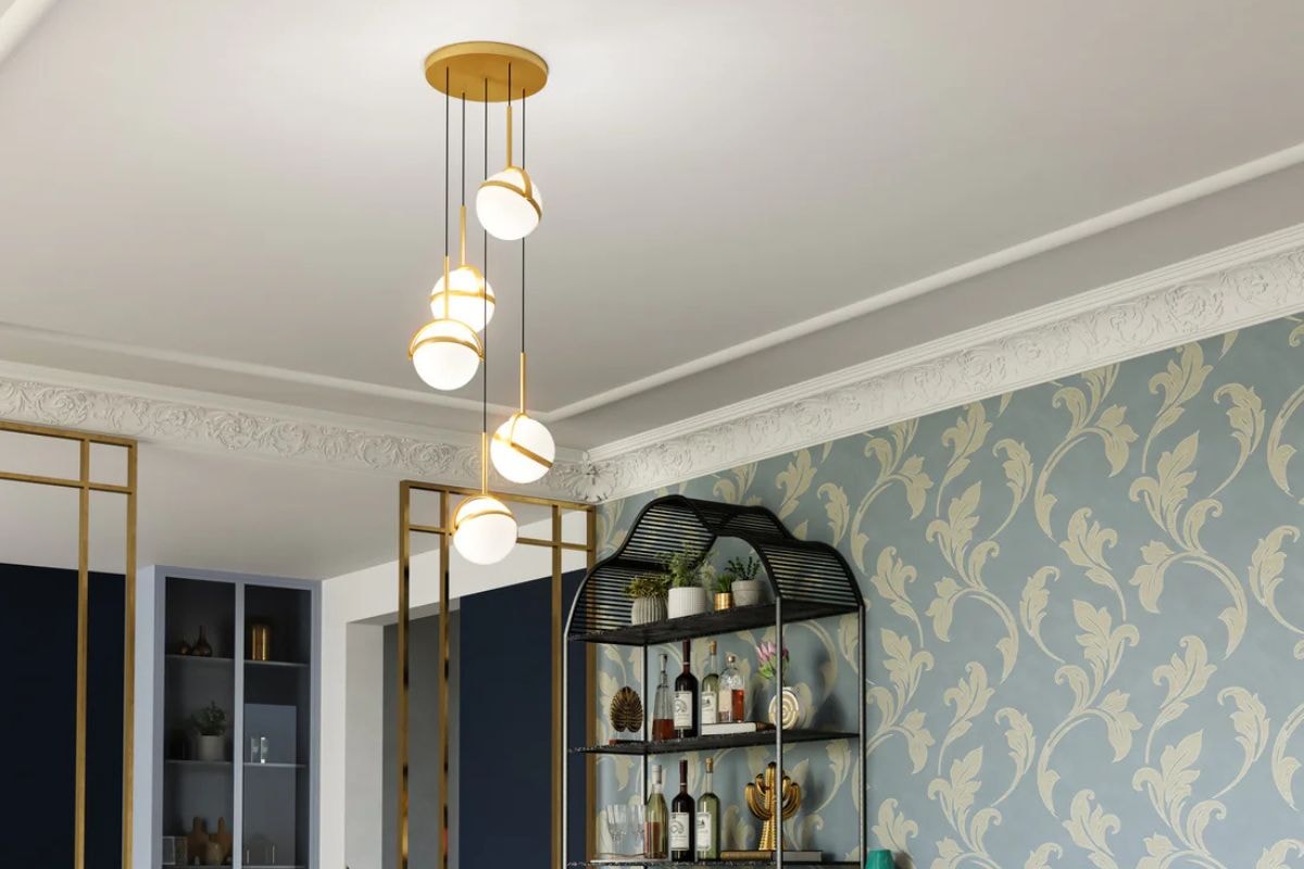Pendant lights form a modern light fixture with layered globes hanging from the ceiling.