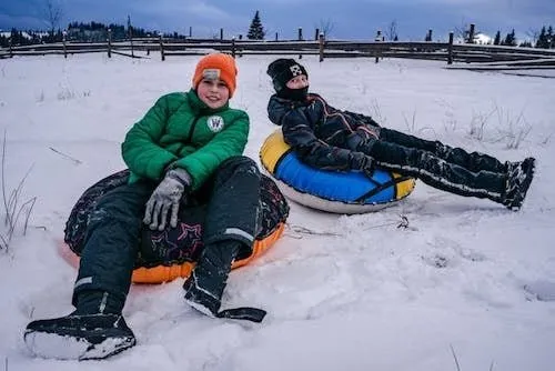 Kids out snow tubing, one of the most fun outdoor activities each winter