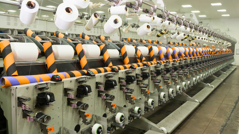 A large fabric factory with lots of spinning machines