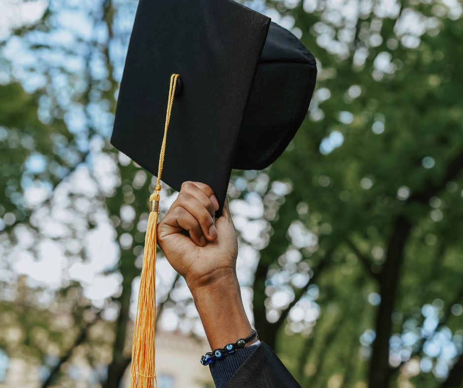 An image of a person holding a graduation cap, symbolizing the success of drug rehab and answering the question does drug rehab work