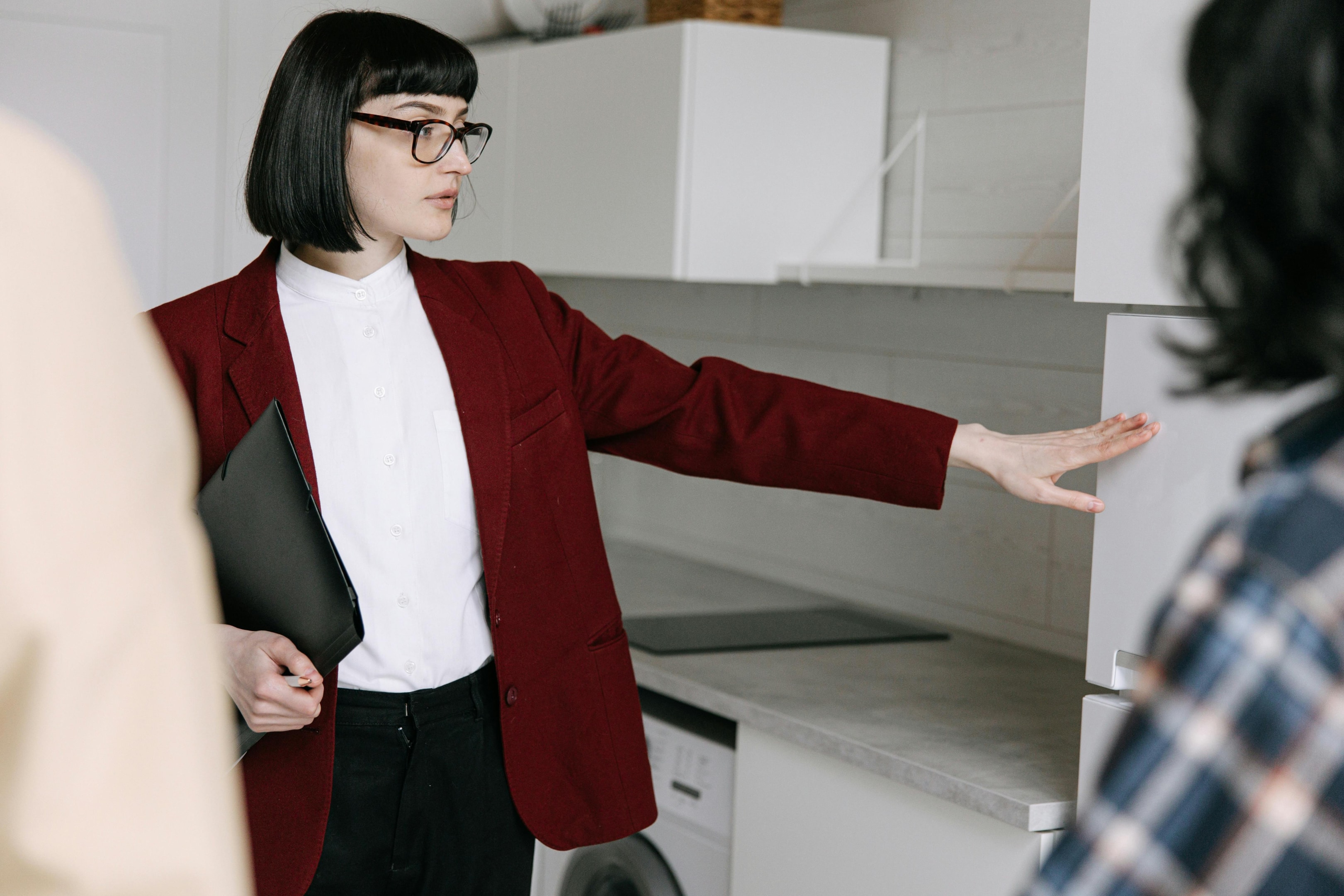 Real estate investor walks through property with motivated sellers.