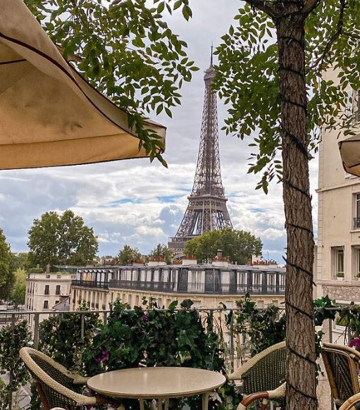 eiffel tower view with traditional homemade dishes