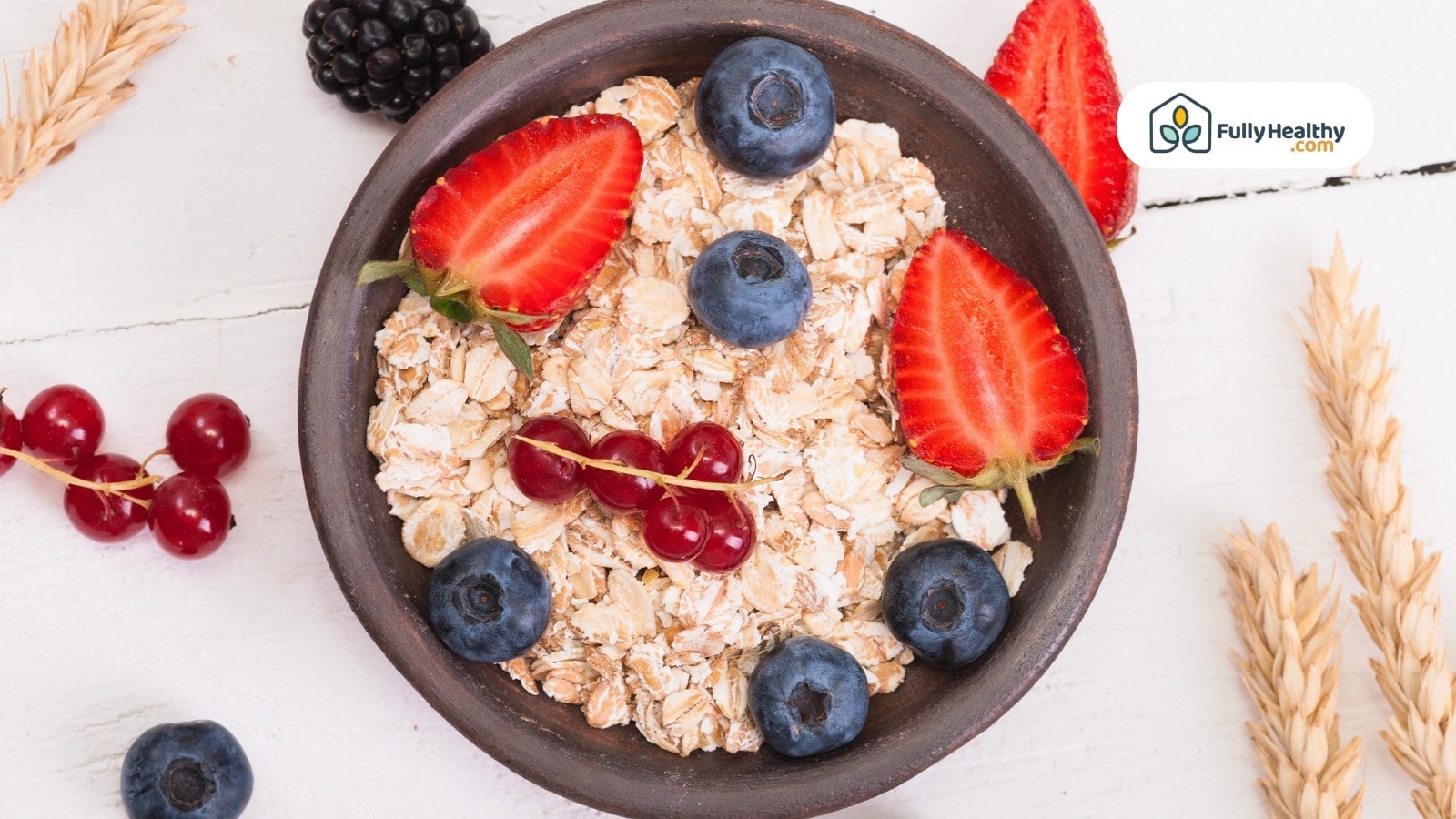 Plain cereal loops with milk in white bowl and spoon