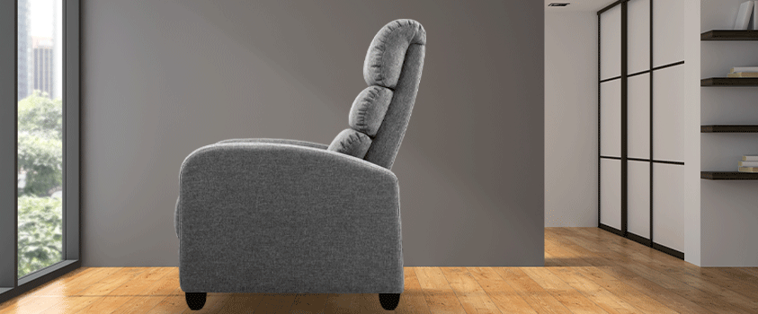 An Artiss Grey Fabric Luxury Recliner Chair, set in an empty living room facing a bay window.