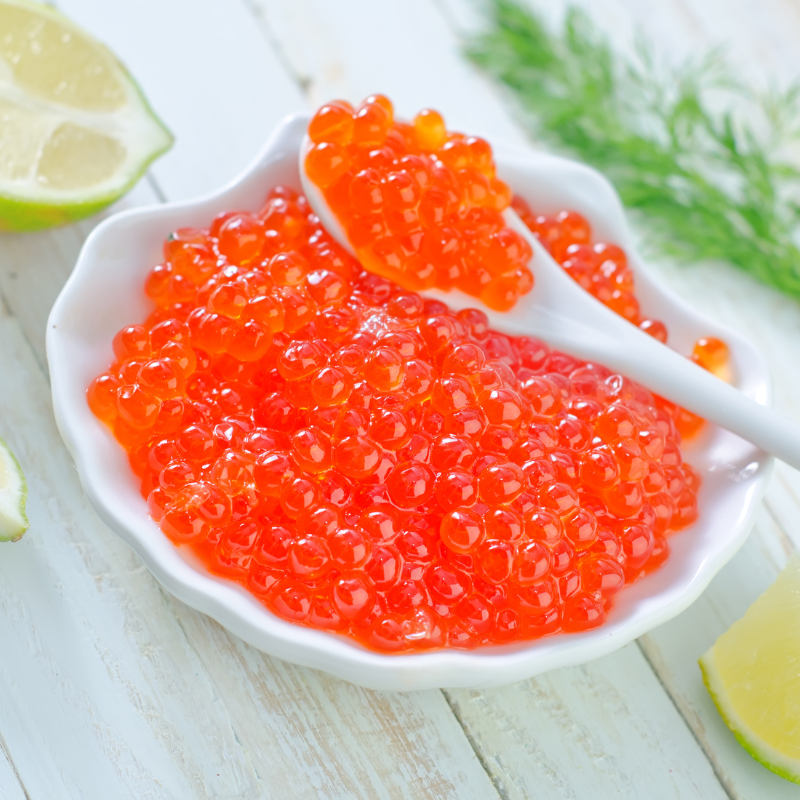 Photograph of salmon caviar (fish eggs), a popular alternative in the caviar world.