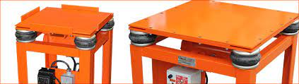 A flat deck vibratory table used for quality testing and packaging applications