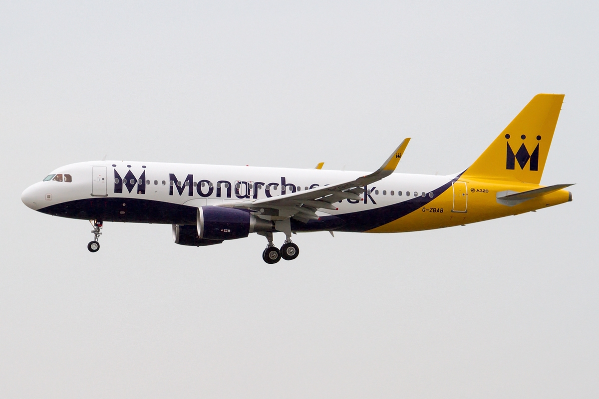 Defunct airlines Monarch airliner landing.